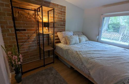 Wunsdorf House | Modern bungalow with direct lake access and fireplace