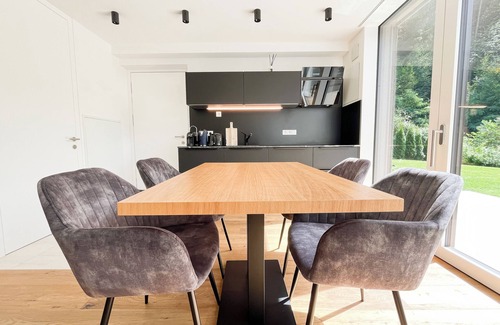 Sant'Andrea in Monte Apartment | modern, luxury, private entrance, garden, terrace, and stunning mountain views.