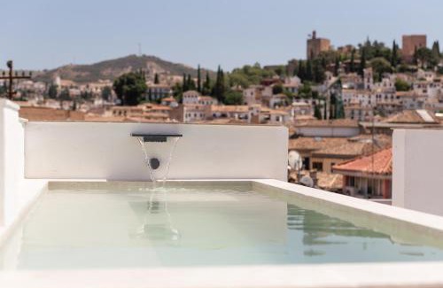 Central District Apartment | Navas 402 Ático & Pool Alhambra views