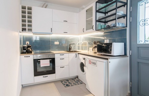 Exarhia Apartment | Neoclassical house with garden in the center of Athens.