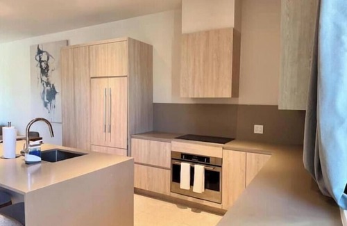 Westwind Condo | New build - 1bd - Gated - Pool Beach and Gym access - Quiet Area