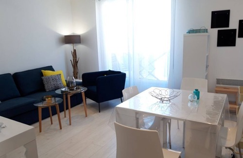 Quartier des Dunes Apartment | New duplex apartment, sea view with balcony in the center of town, private parking.