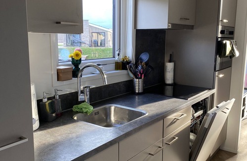 Municipality of Kampen House | NEW Elegant Holiday Home Chalet on a Lake in Kampen, Netherlands Boat waterfront