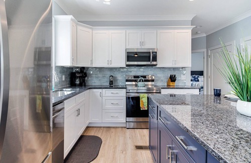 Tranquil Harbour House | New gorgeous home with Pool, New 8 seater Golf Cart, elevator, with easy access to beach