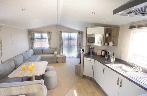 Rookley House | New in 2018. 12ft-wide contemporary caravan with one double and two twin.