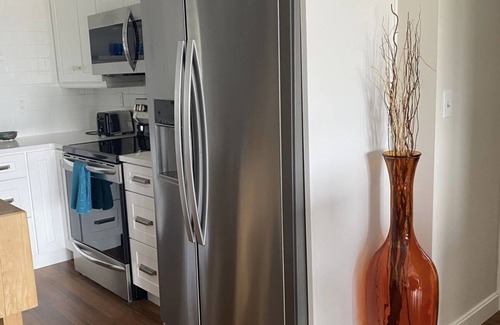Yachting Village Condo | NEW! Monthly Rental with Water Views