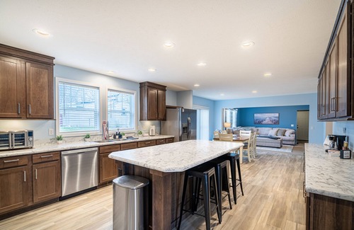 South Haven House | New Remodel on Black River with Hot Tub, Kayaks, Gym, Fireplace, & Game Room!