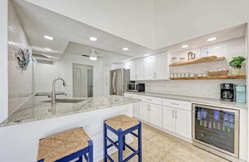 Palma Sola House | NEW Saltwater pool/spa home! Close to IMG, beaches