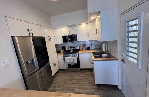 Isla Verde Condo | Newly renovated 2-bed, 2-full bath condo with large pool, minutes from the beach