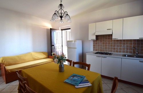 Northern Sardinia Apartment | Nice apartment for 4 guests with WIFI, pool, TV and balcony, close to Castelsardo