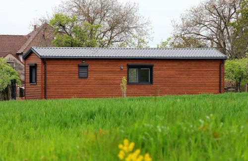 Stropesin House | Nový mobilheim (srubového typu)