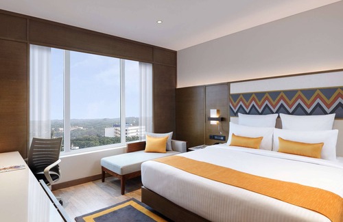 Sualkuchi Hotel | Novotel Guwahati GS Road Hotel