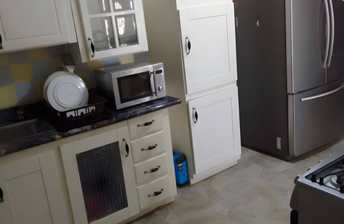Whitehouse House | Oceanview Hilltop 2-Bedroom Unit in White House, JA with 75" Smart TV, AC & Wifi