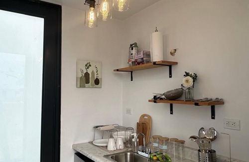 Aguadilla Pueblo Apartment | ONE BEDROOM TINY HOME ALL TO YOURSELF W/OCEAN VIEW AND FULL BATHROOM & KITCHEN