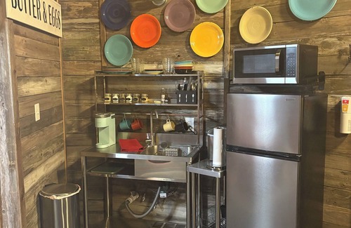 Navasota Cabin | One of a kind grain bin silo cabin getaway near wedding venues and A&M!