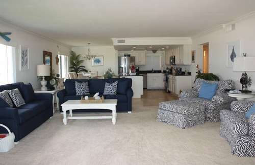 New Smyrna Beach Condo | One of a kind ground floor, three bedroom, three bath corner. Amazing south east ocean views.