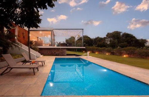 Shirur Villa | Open House by StayVista - Nestled in nature, featuring a Swimming pool & Expansive lawn for a serene retreat