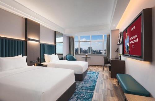 Hantai District Hotel | Park Inn by Radisson Hanzhong Central Square & High speed rail station