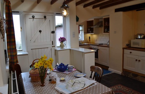 Culbone Cottage | Parsonage Farm Stables, with stunning views down to the sea