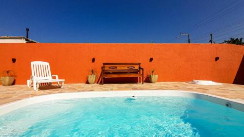 Guarda do Embau House | Partiu Praia SC piscinas privativas, ar condicionado, internet, próximo ao mar e centrinho três minutos a pé