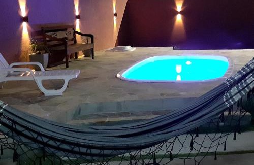 Guarda do Embau House | Partiu Praia SC piscinas privativas, ar condicionado, internet, próximo ao mar e centrinho três minutos a pé
