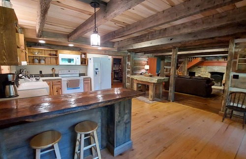 Lynx Cabin | Peaceful historic log cabin getaway on 40 acres - NO cleaning fee!