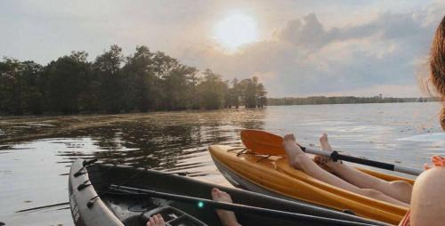 Oil City House | Pelican's Nestcaddo Lake With Kayaks