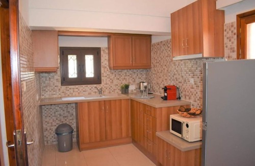 Kamari Apartment | Plethora Home: Quiet With Terrace in Traditional Kamari - bus Stop 3min Away