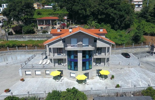 Raxo Apartment | Pool, garden, playground, tennis court and barbecue. 400 m. the beach