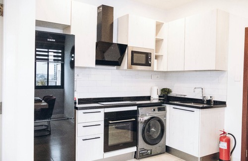 Dzorwulu Apartment | Pool View Executive 1 Bed - Tribute Airport, 1 Bedroom Luxury Apartment with Balcony at Tribute - Ai