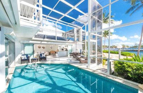 Rum Point House | Pools of the Kai 6 - Beachfront Condo with Private Pool Atrium, Modern Kitchen, and Outdoor Grill
