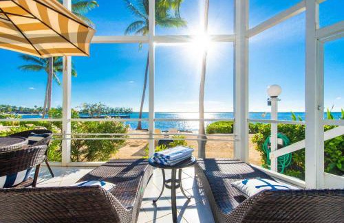 Rum Point House | Pools of the Kai 6 - Beachfront Condo with Private Pool Atrium, Modern Kitchen, and Outdoor Grill
