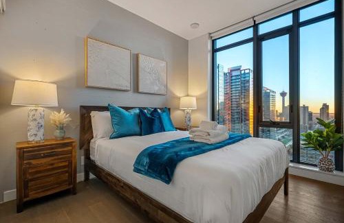 Connaught House | Poolside Bliss In the Heart of Downtown! 22 FL w Tower Views! FREE Banff Pass, Gym, Wine, Parking, Summer Outdoor Pool!