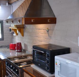 San Rafael Bed & Breakfast | POSADA ROSSINA Habitaciones con baño privado y ambientes compartidos