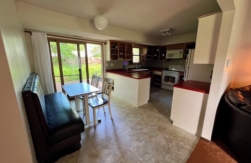 Lawrence House | Practical Zen II: 4-bdrm 2-bth 5-bed house in welcoming neighborhood.