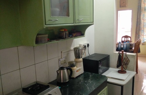 Sualkuchi Apartment | Pristine Greens , the guest will be greeted by either the owner.