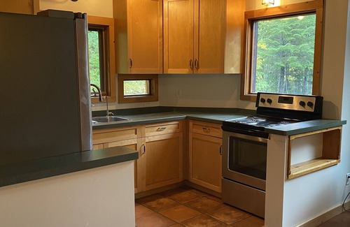 Proctor House | Private Mossy Mountain Suite nestled in the forest by Kootenay Lake