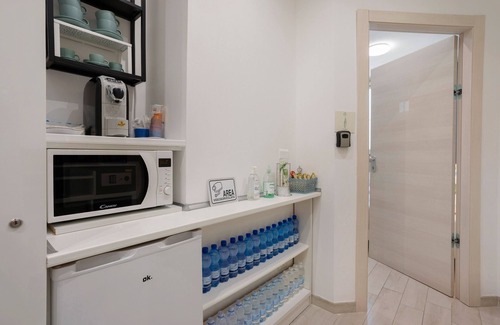 Quarto Cagnino Apartment | Quadruple Room with Wi-Fi and Air Conditioning