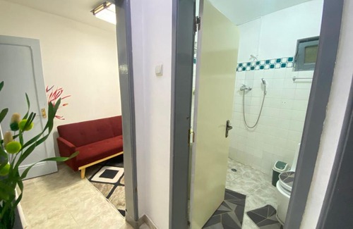 Lubango Apartment | Quarto salinha e WC