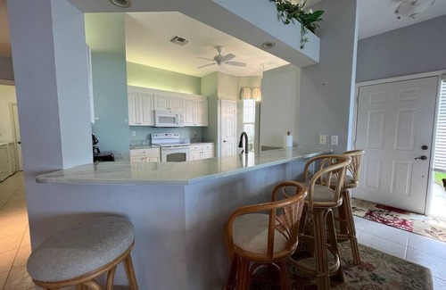Crown Pointe Condo | Quiet neighborhood with beautiful sunset views, just minutes from the beach.