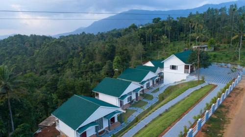Devikolam Hotel | Rainwood Aurum Resort