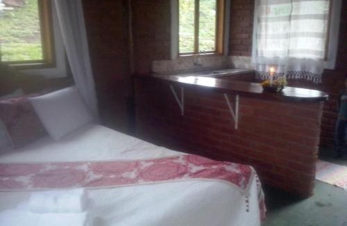 Aiuruoca House | RECANTO DO LEÃO