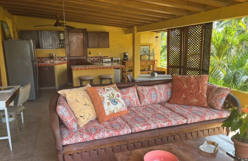 Diaz Ordaz Condo | Relax amidst the palms in a 1-bedroom oceanfront condo at Los Tules.