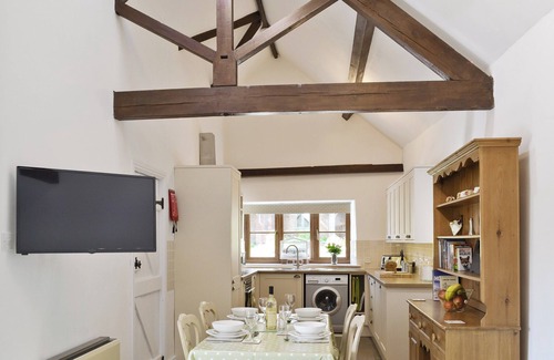 Munslow Cottage | Relax in front of the woodburner in this single-storey barn conversion.