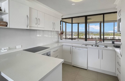 Maroochydore Apartment | Relaxing Escape: Pool, Tennis Court, Garden Terrace & Water Views
