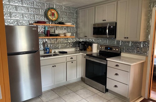 Carrabelle Cottage | Remodeled historic cottage with a peek of the Gulf of Mexico.