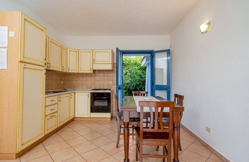 Monte Petrosu Apartment | Residence La Tartaruga Garden with swimming pool