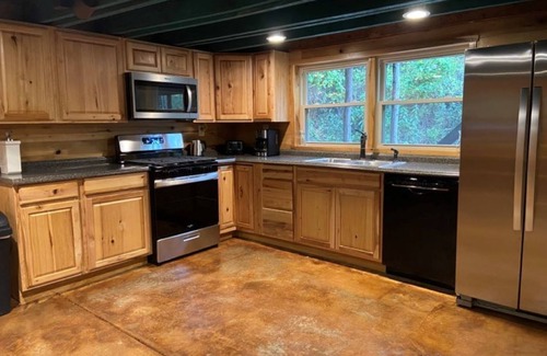 Langsville House | Restored 100-year-old Barn House in Private Forest. Perfect for gatherings.