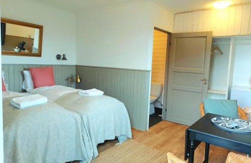 Hella House | Riverfront Lodge Hella