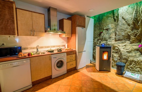 La Omanuela Apartment | Riverside Rustic Retreat